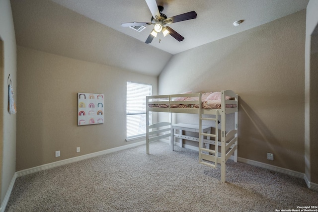 carpeted bedroom with ceiling fan and lofted ceiling