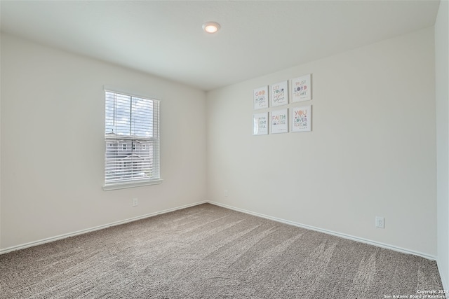 view of carpeted spare room