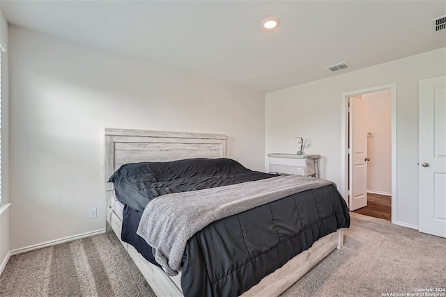 bedroom featuring carpet