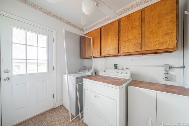 washroom with light carpet, cabinets, washing machine and dryer, and ceiling fan