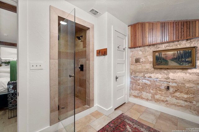 bathroom featuring vanity and vaulted ceiling