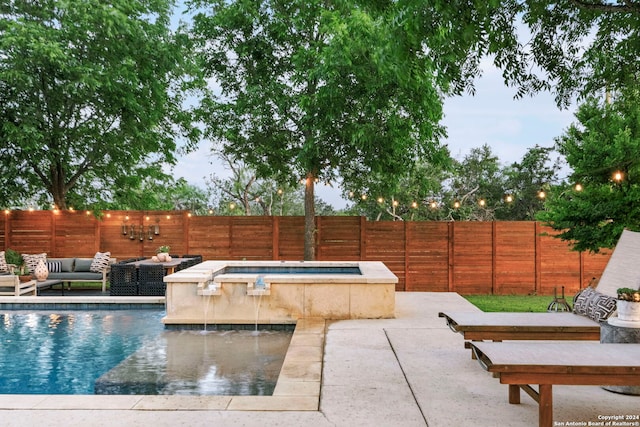 view of swimming pool featuring an in ground hot tub, a patio area, an outdoor living space, and pool water feature