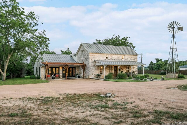 exterior space with a garage and an outdoor structure