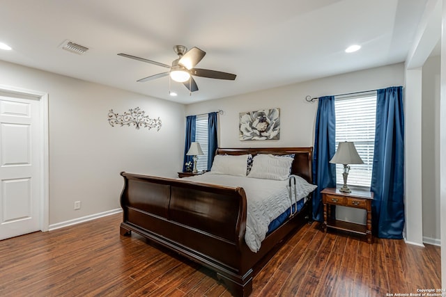 bedroom featuring dark wood-type flooring and ceiling fan