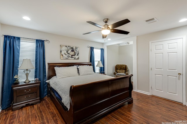 bedroom featuring dark wood-type flooring and ceiling fan