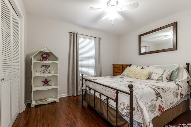 bedroom with ceiling fan, dark hardwood / wood-style floors, and a closet