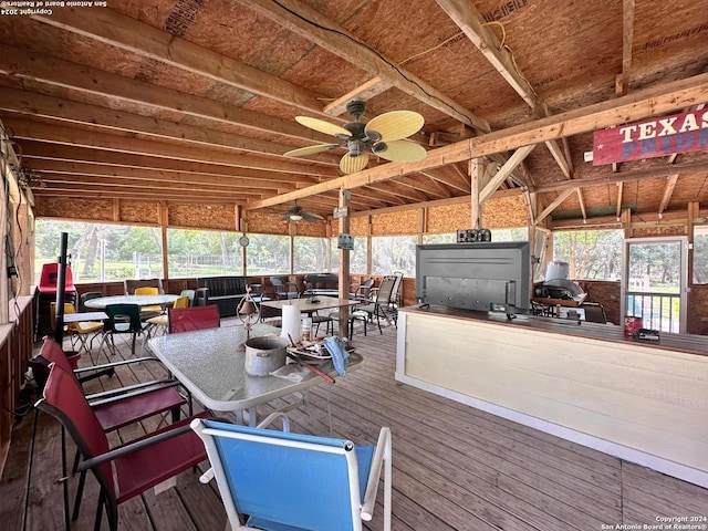 wooden deck featuring ceiling fan