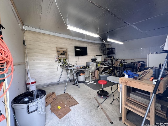 garage with a workshop area