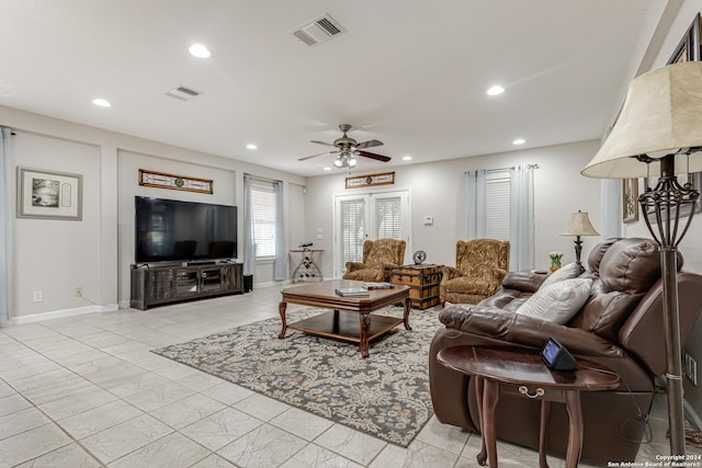 living room with ceiling fan