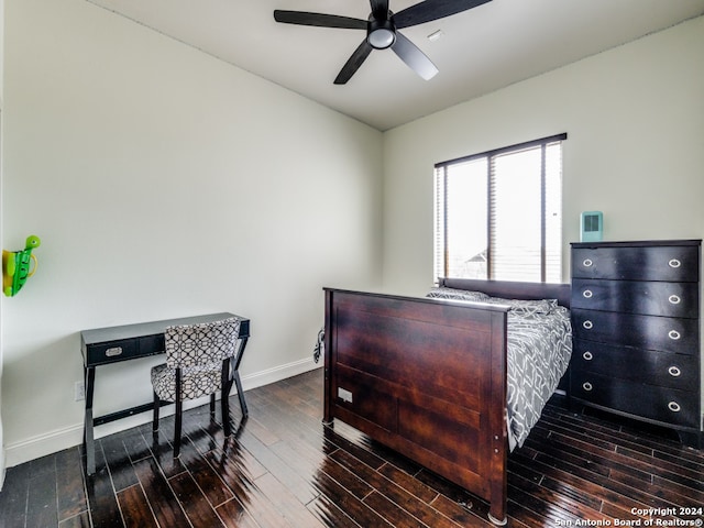 bedroom with ceiling fan and hardwood / wood-style flooring