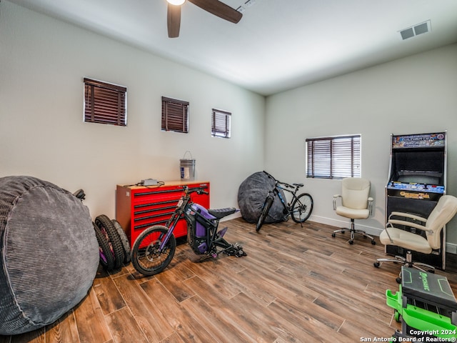 interior space featuring ceiling fan and hardwood / wood-style flooring