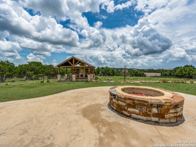 surrounding community featuring a yard and a gazebo