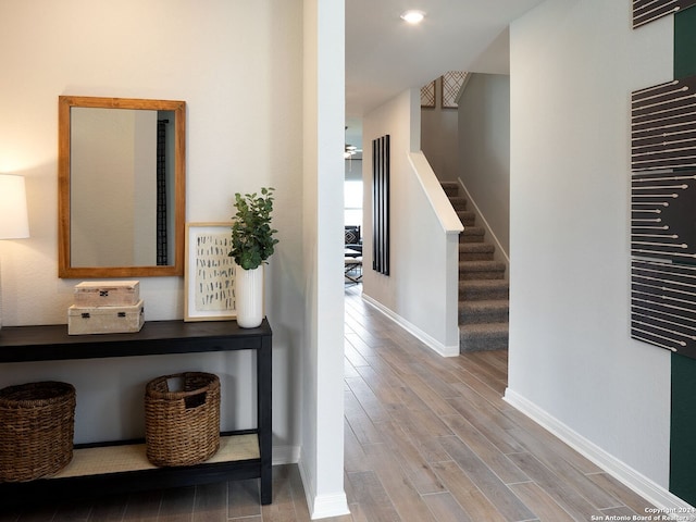 corridor featuring hardwood / wood-style flooring