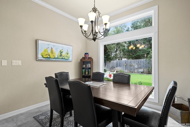 tiled dining area featuring crown molding and a notable chandelier