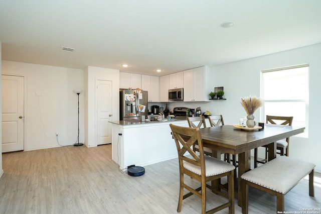 dining area featuring light hardwood / wood-style flooring