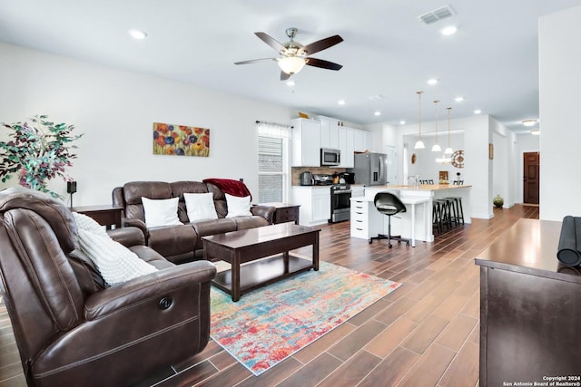 living room with ceiling fan