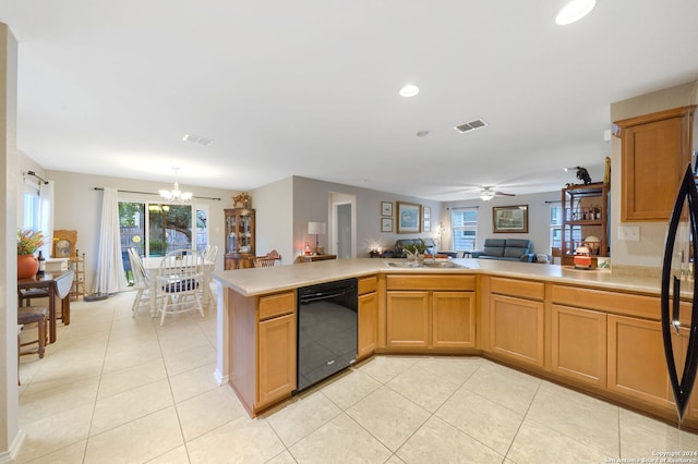 kitchen with sink, kitchen peninsula, light tile patterned floors, ceiling fan with notable chandelier, and dishwasher