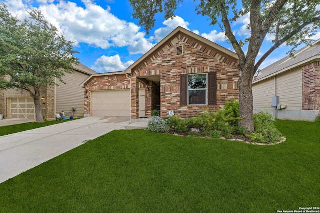 view of front facade with a garage and a front yard