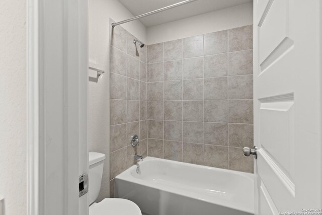 bathroom featuring a shower with shower door and hardwood / wood-style floors