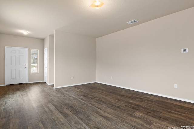 entryway with hardwood / wood-style flooring