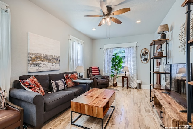 living room with recessed lighting, light wood-style flooring, baseboards, and ceiling fan