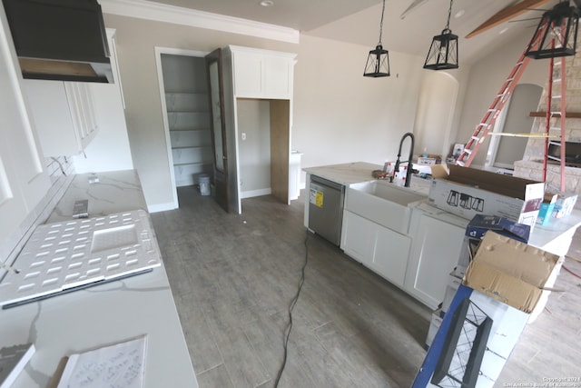 kitchen with white cabinets, hanging light fixtures, dark wood-type flooring, dishwasher, and vaulted ceiling