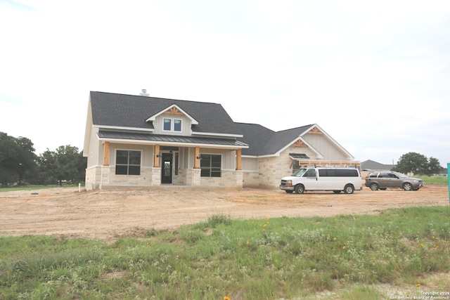 view of front facade with covered porch