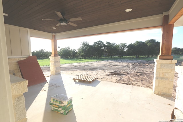 view of patio featuring ceiling fan