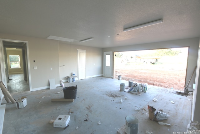 interior space featuring a textured ceiling