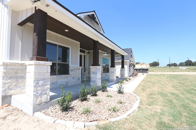 view of property exterior featuring a lawn