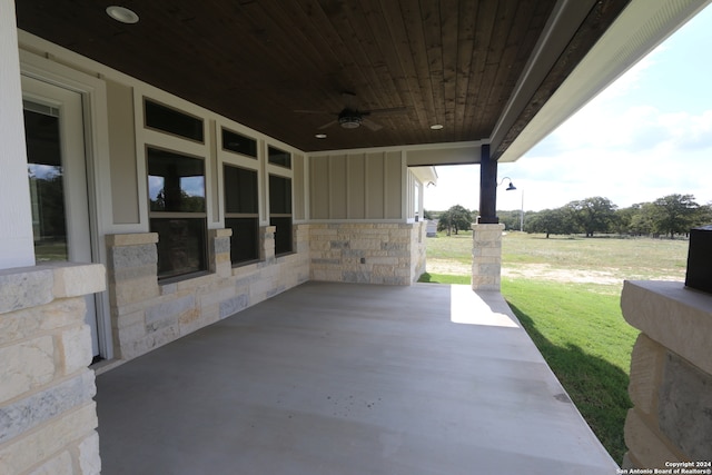 view of patio featuring ceiling fan