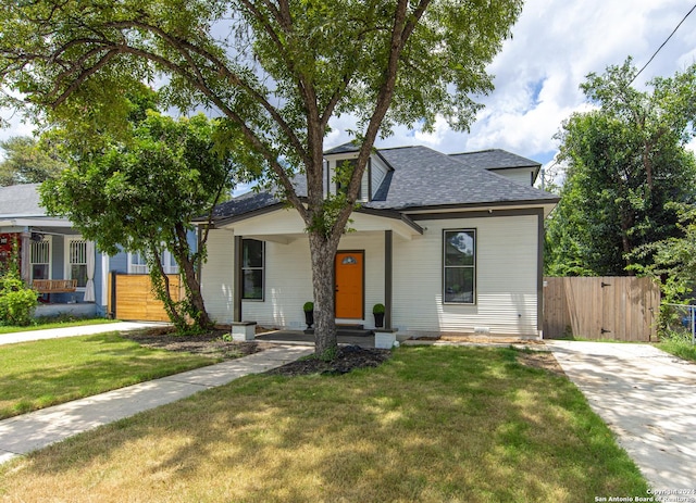 view of front of house featuring a porch and a front yard