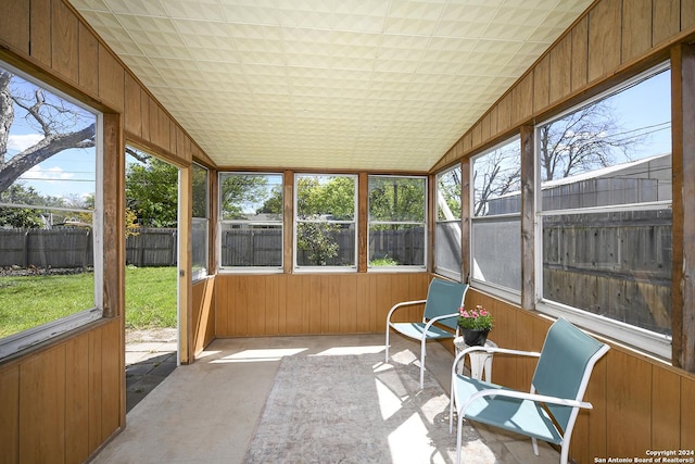 sunroom / solarium with vaulted ceiling