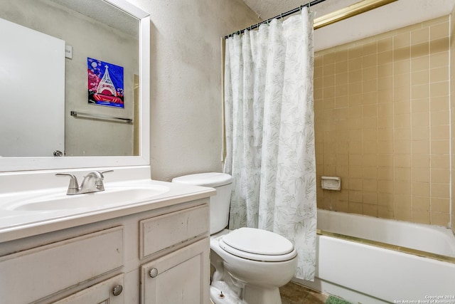 full bathroom with vanity, toilet, and shower / bath combo with shower curtain