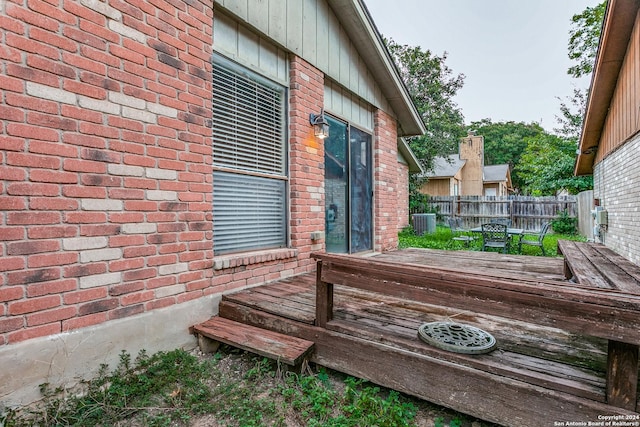 wooden deck with central AC unit