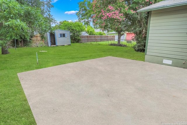 view of patio with a shed