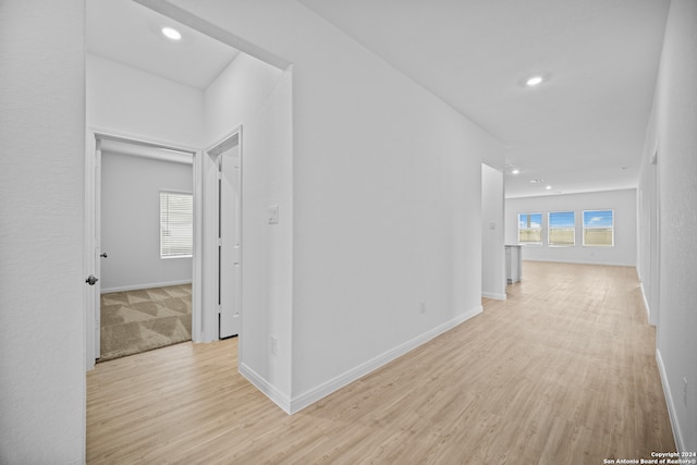 hallway featuring light hardwood / wood-style flooring