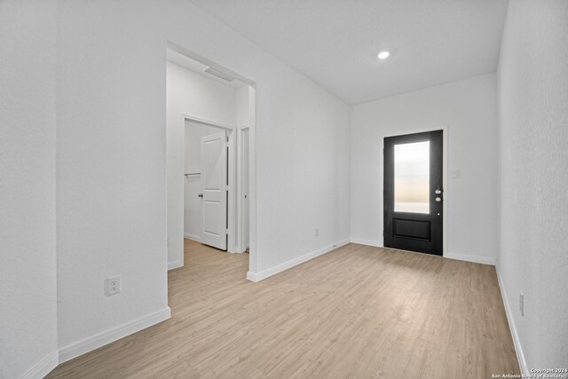 entrance foyer with light hardwood / wood-style flooring