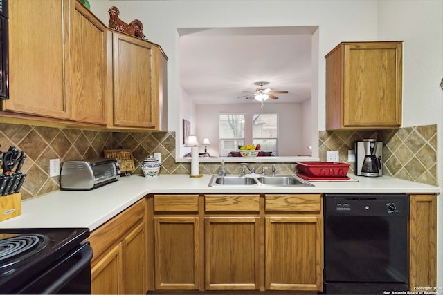 kitchen with sink, dishwasher, ceiling fan, and backsplash