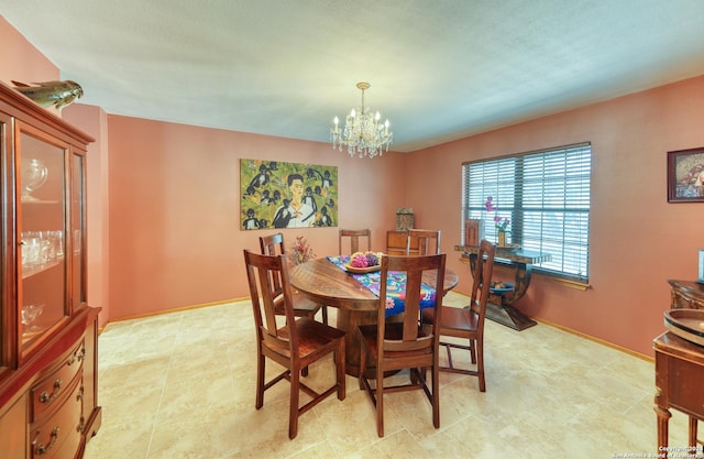 dining room featuring an inviting chandelier