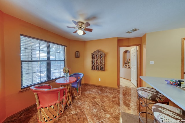 dining room with ceiling fan