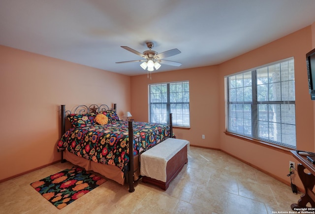 bedroom featuring ceiling fan