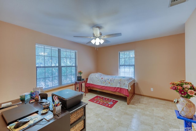 bedroom featuring ceiling fan