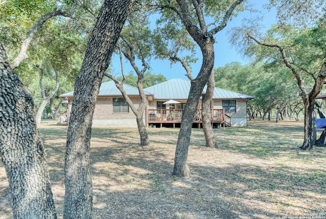 view of yard featuring a deck