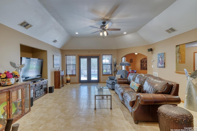 living room with french doors, ceiling fan, and lofted ceiling