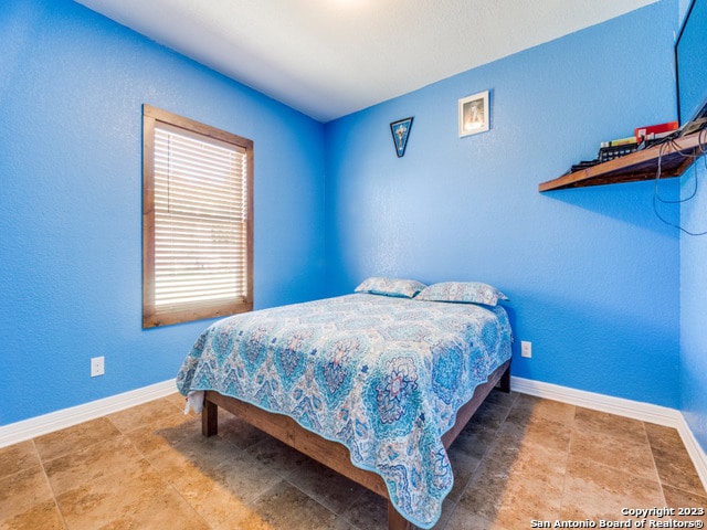 view of tiled bedroom