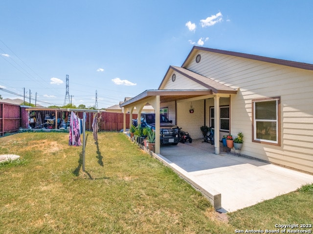 view of yard with a carport