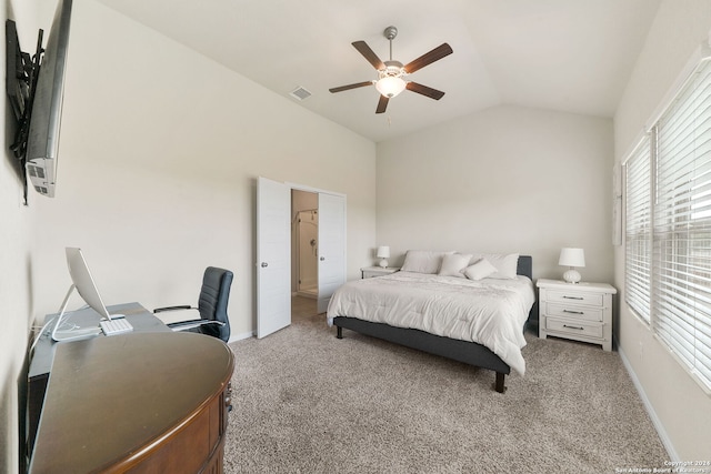 bedroom featuring lofted ceiling, light carpet, and ceiling fan