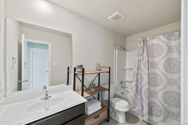 full bathroom with vanity, toilet, and shower / bath combo with shower curtain