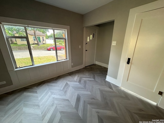 empty room featuring parquet floors